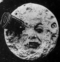 A spaceship has plunged into the left eye of the man in the moon.
